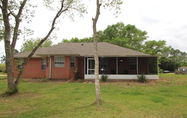 Building Photo - Stunning West Pensacola Home on Nearly an ...