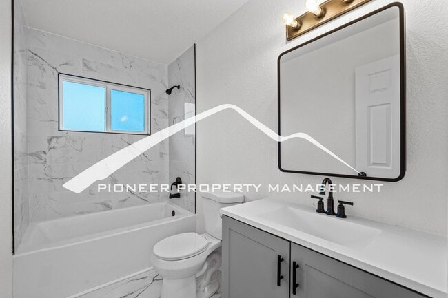 Building Photo - Stylishly Renovated Home with Enclosed Fence, AC and 1 Car Garage