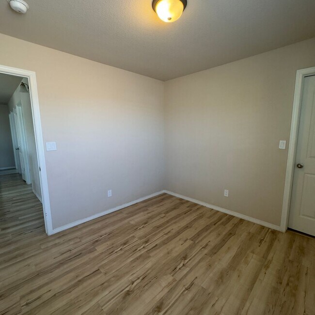 Building Photo - 4 Bedrooms, 3 Baths, a Pool, and Solar Panels!