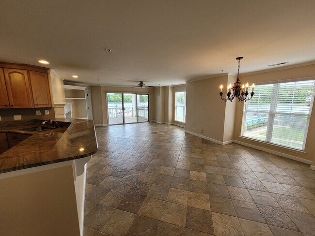 Building Photo - WATERFRONT - 3 Bed/2 Bath Condo - End Unit - Stunning View - Lake Access - Community Pool - Tenni...