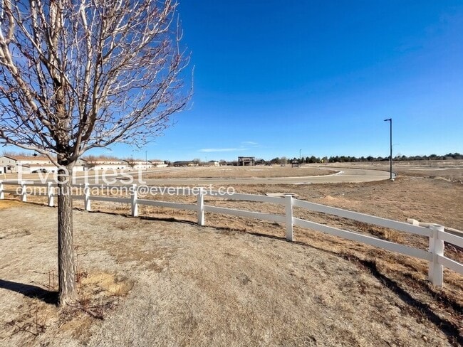 Building Photo - 4 Bed, 4 Bath Townhome with Fenced Yard & Garage / Available Soon!
