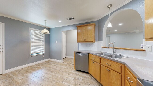 Building Photo - Completely repainted 4 bedroom ALL TILE ho...