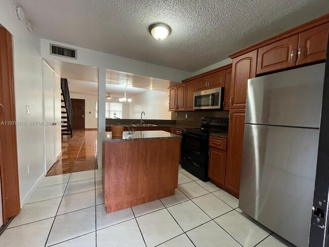 Building Photo - 5901 W 18th Ct