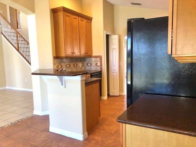 Building Photo - EAGLE CREEK LAKE NONA! WELCOME HOME! Beautiful water views! Spacious 2 story-3 bedroom 2.5 bath h...