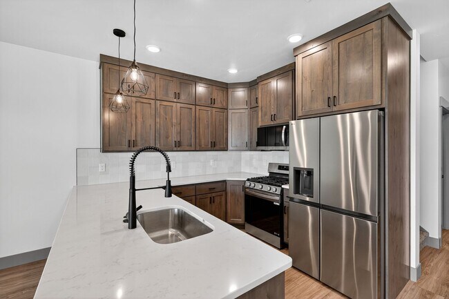 Building Photo - MUST SEE TOWNHOMES IN AMMON RIGHT OFF BEAC...