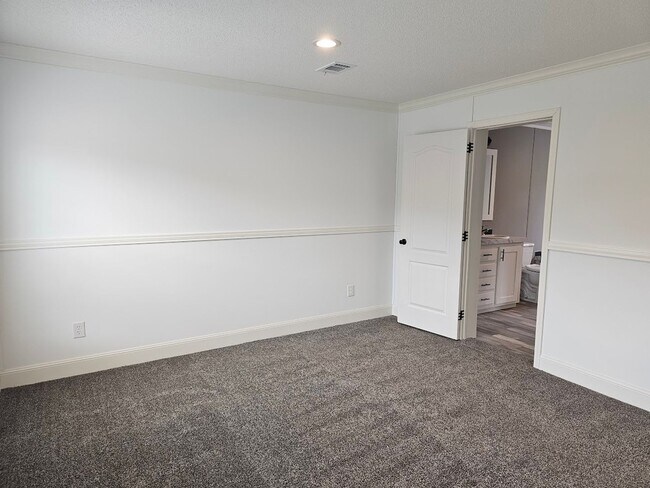 Building Photo - Welcome Home! Spacious 3-Bed, 2-Bath Split Floor Plan on ¾ Acre Lot