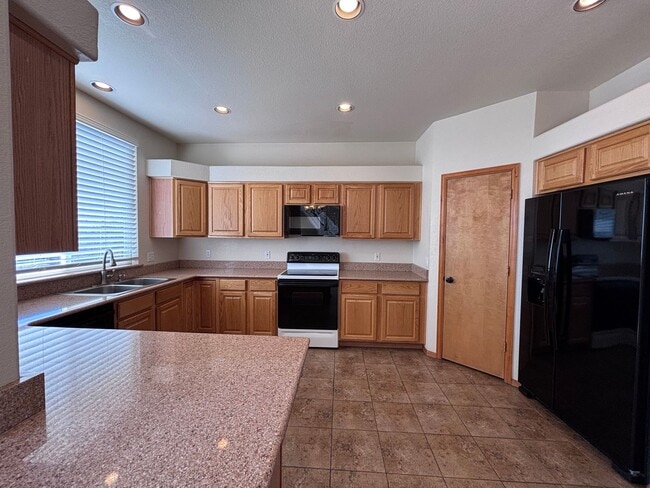 Building Photo - 4 Bed 3.5 Bath Home with Air Conditioning! - MileStone Real Estate Services - Available Now!