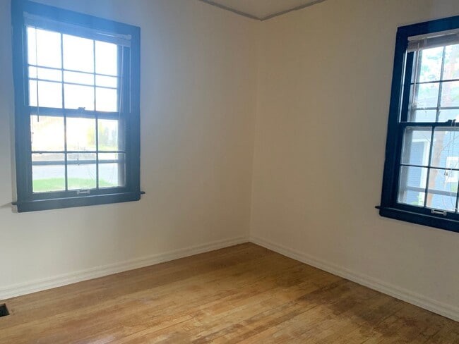 Building Photo - Three bedroom home with beautiful hardwood floors and central air!