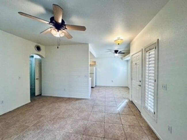 Building Photo - Cozy 1st-floor condo unit with 2 bedrooms and 2 bathrooms. Located in a guard-gated community in ...