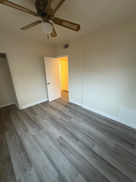Bedroom #3 looking toward the entry door and hallway, closet is on the left - 23162 Smith Rd