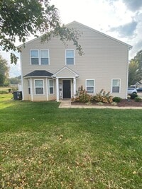 Building Photo - End Unit with large yard.