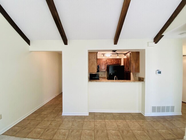 Building Photo - {12030 - F}  Updated Condo in Fantastic Location + Top Floor + Covered Parking Included + Private...