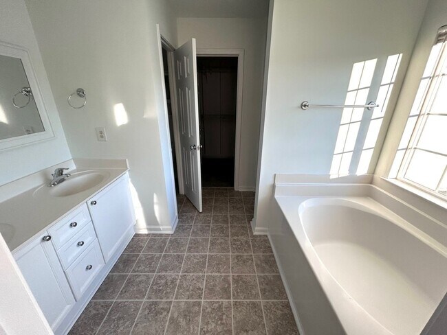 Building Photo - Stunning 4BR Home with amazing pond views!