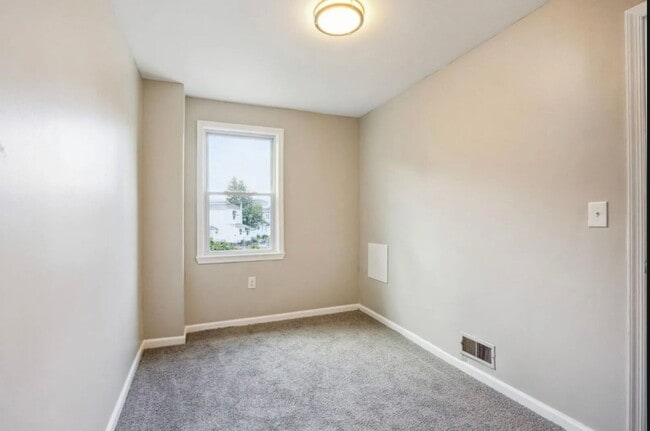 Building Photo - Fully Renovated Two-Bedroom Townhome In Du...