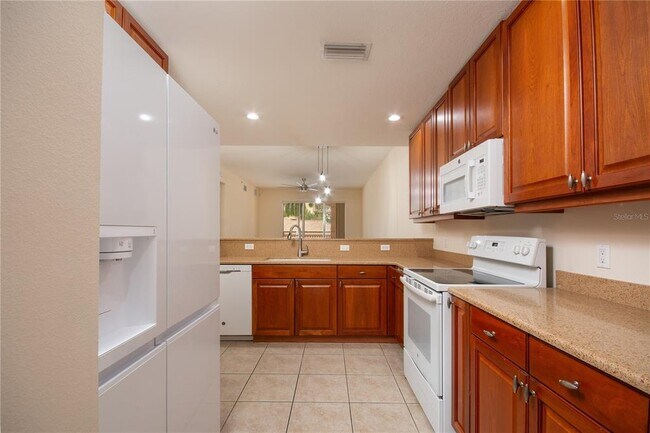 Building Photo - 5591 Cannes Cir