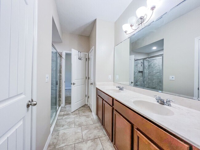 Building Photo - Spacious 4-Bedroom Townhome in Harmony – A Perfect Blend of Nature & Comfort!