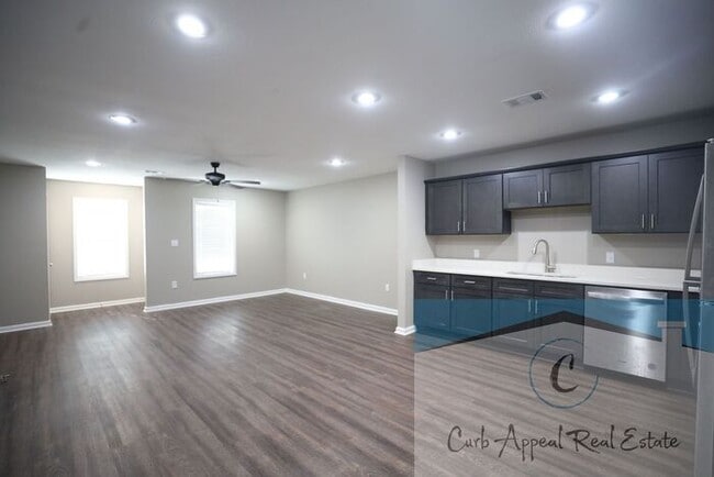 Building Photo - Move in special $800!! Luxury 2 bed, 1 bath duplex - new construction!! Washer, dryer, utilities ...