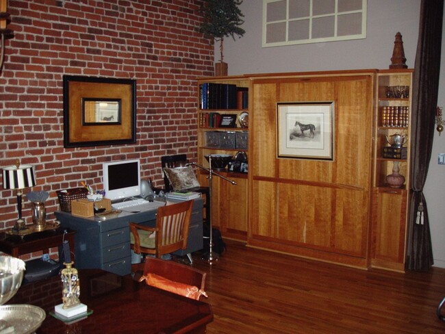 Building Photo - Open floor living at its best! 1 BR/2 BA l...