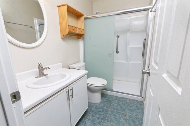 Building Photo - Bright, shiny, and updated compact home ne...