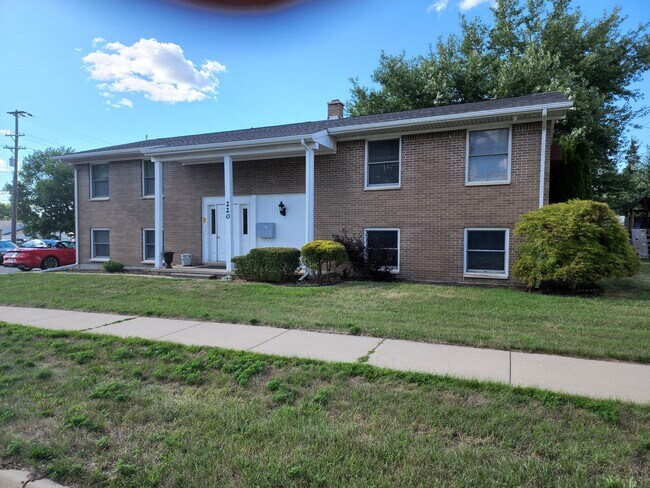 front of building - 220 W Frank St