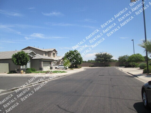 Building Photo - 12823 W Modesto Dr