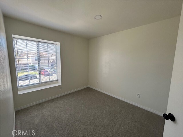 Building Photo - 1009 Whispering Wood Ln