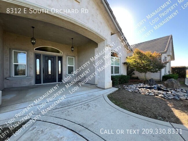 Building Photo - 8312 E Orchard Rd