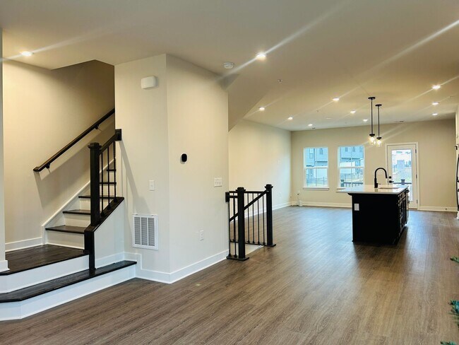 Building Photo - New Construction • 4 BR • 2 Full / 2 Half BA • End Unit Townhome in Village Town – Fayetteville’s...