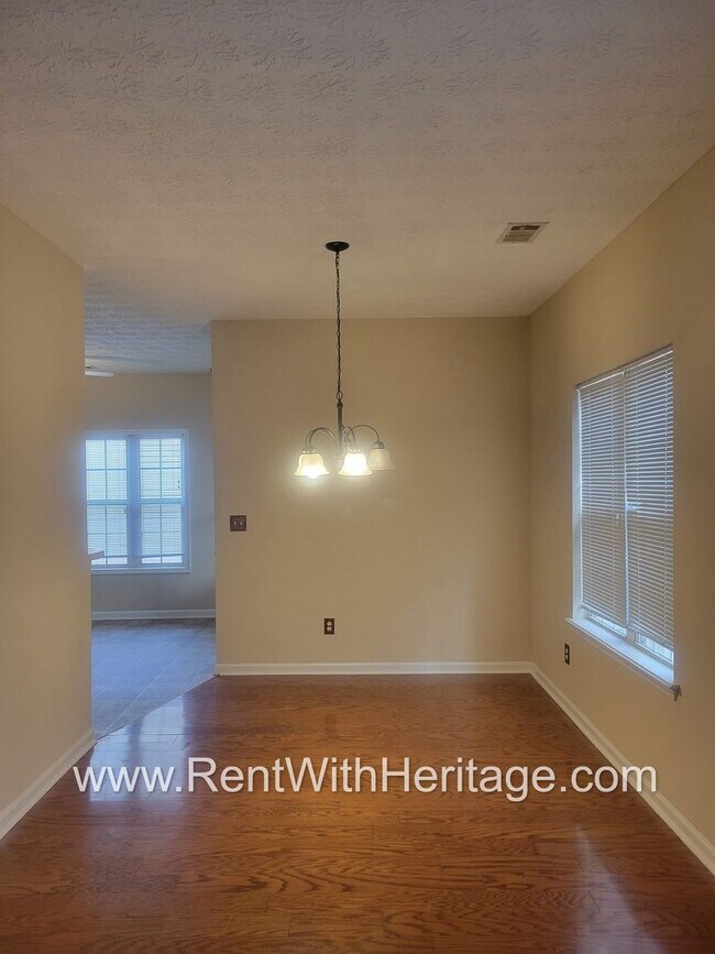 Building Photo - WOW!!...GORGEOUS HOME/HARDWOOD FLOORS/ UPGRADES GALLORE / SWIM - TENNIS