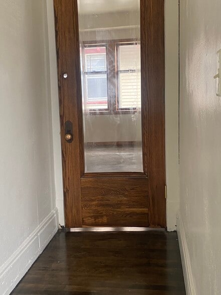 this door leads to stairs to the front porch - 2550 N 45th St