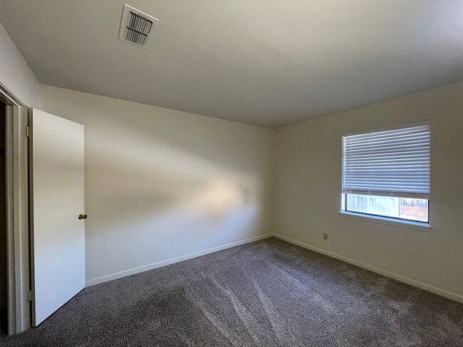 Building Photo - A Great Place to Call Home! Master Bedroom...