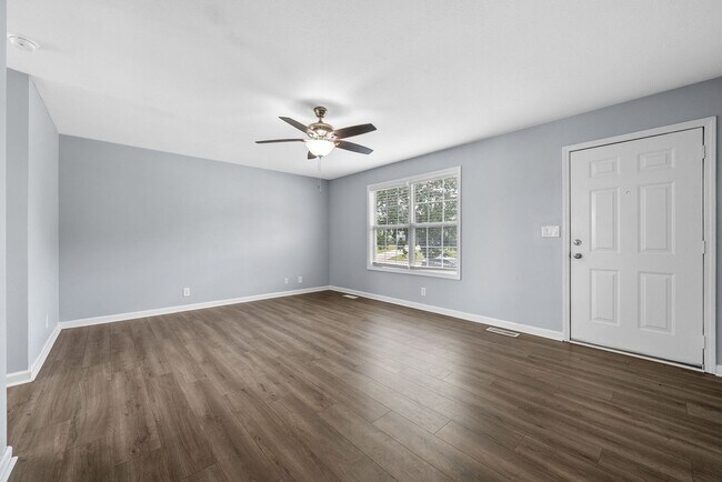 Building Photo - Pet Friendly Three Bedroom with Basement!