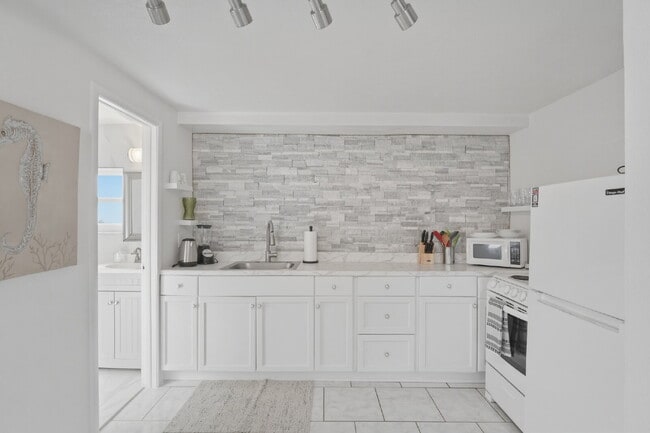 Building Photo - "Warm Mineral Springs - Furnished Studio Apartment"