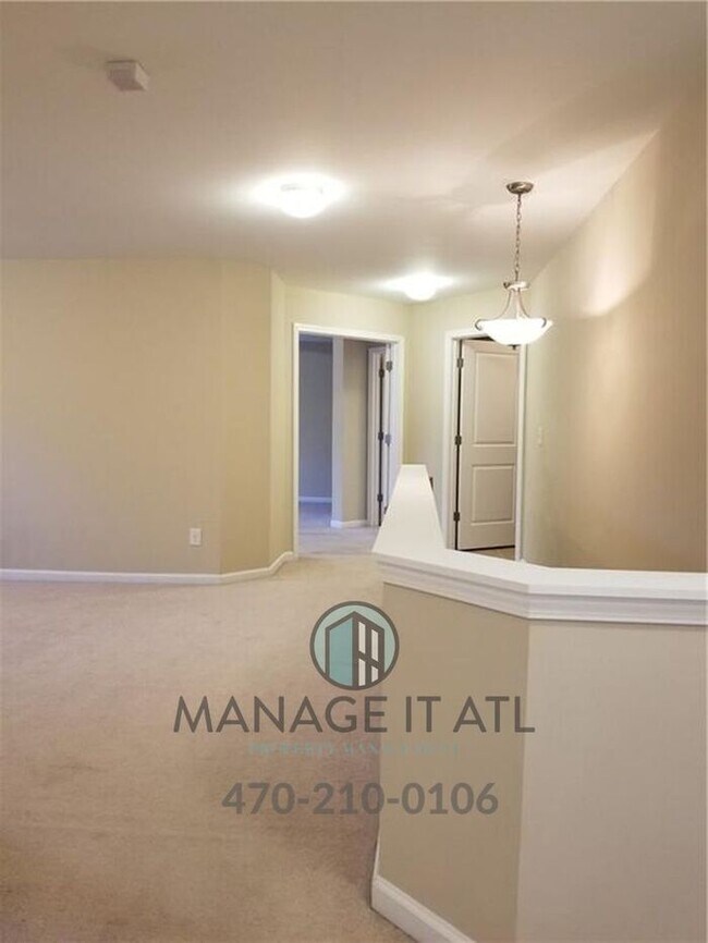 Building Photo - Beautiful 5BR/4BA Home in Just 5 Min from MALL OF GA