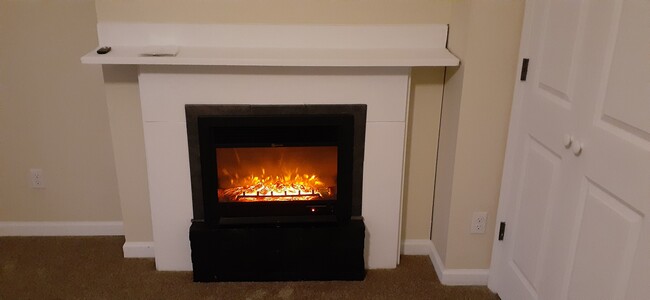 electric fireplace in 2nd floor bedroom - 7718 Brashear St