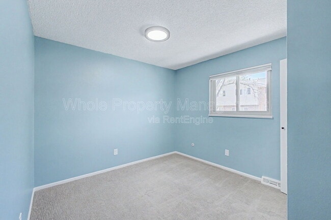 Building Photo - 9037 E Nassau Ave