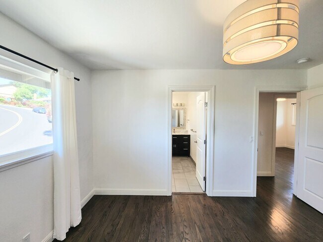 Building Photo - 3 bedroom 3 bathroom hillside Pacifica home with serene views