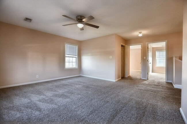 Building Photo - Pet Friendly Three Bedroom with Bonus!