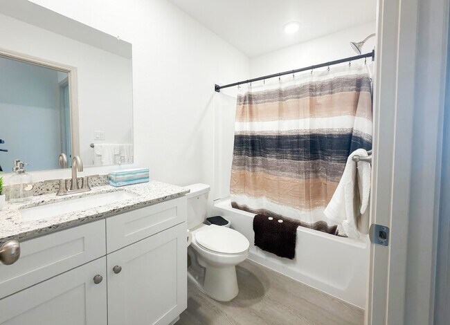 Building Photo - The Perfect Blend of Function and Luxury