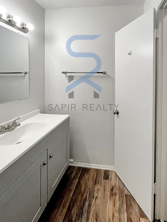 Building Photo - Move in before December 15th and choose your reward: a $250 Amazon Gift Card or a 55" Smart TV!