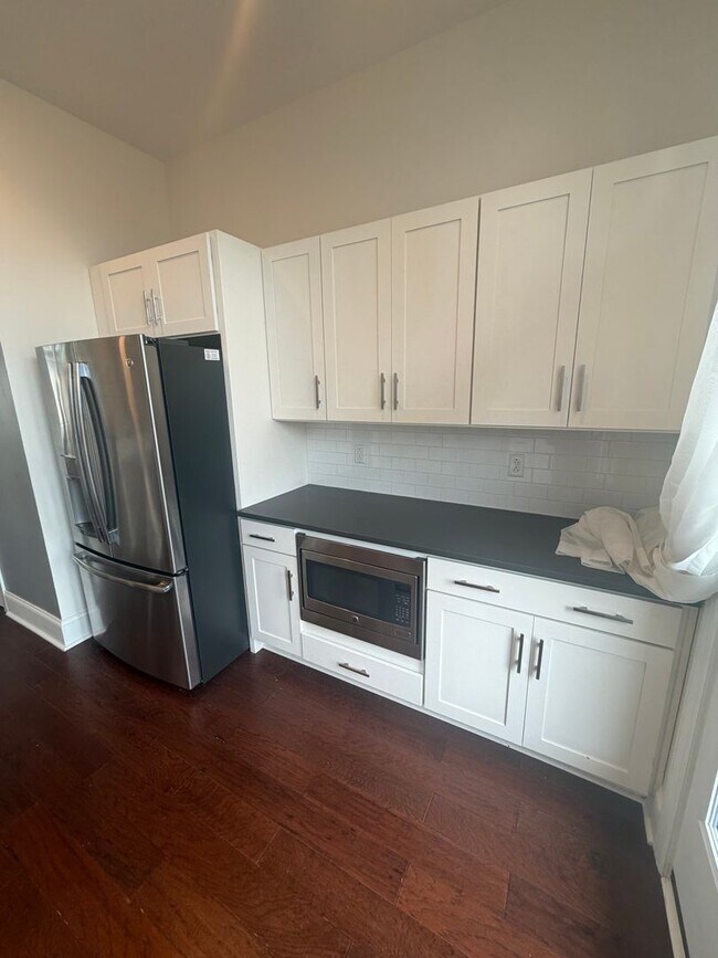 Building Photo - Luxury 3 Bedroom Condo in the Heart of Lawrenceville