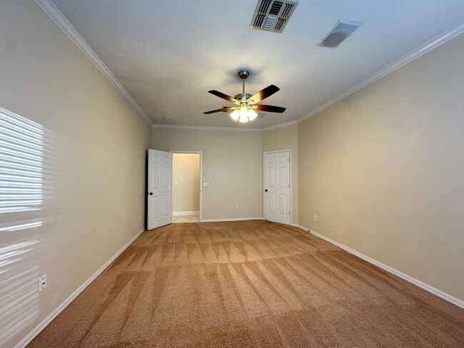 Building Photo - Spacious 4-Bedroom Home with Private Pool and Modern Comforts