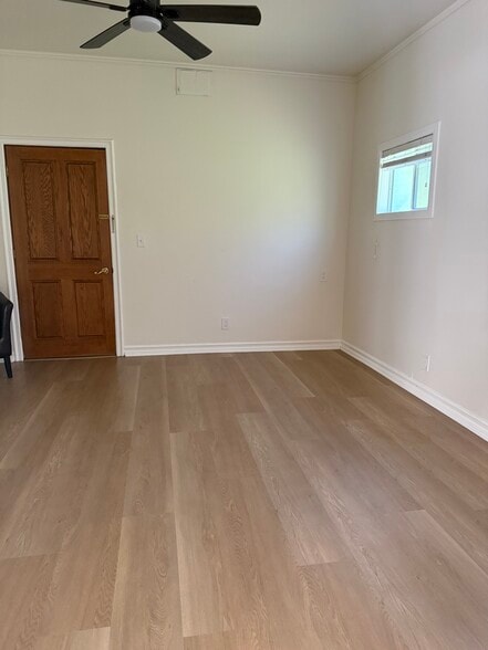 living room looking at door to main kitchen and communal living areas - 305 Emerald St