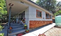 Building Photo - Charming Vintage Gem with Private Frontyard Oasis and Modern Updates