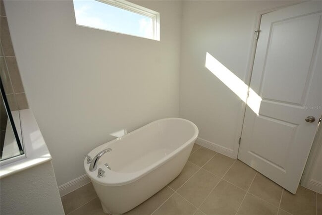 Building Photo - 5144 Firebush Dr