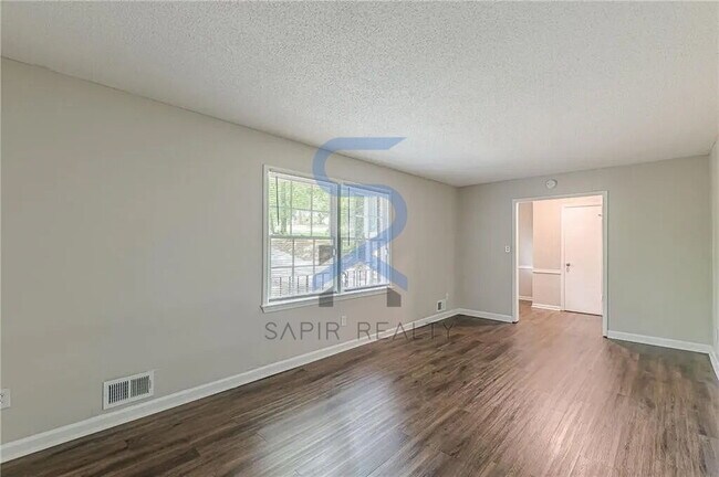 Building Photo - Move in before November 30th and choose your reward: a $250 Amazon Gift Card or a 55 Smart TV!