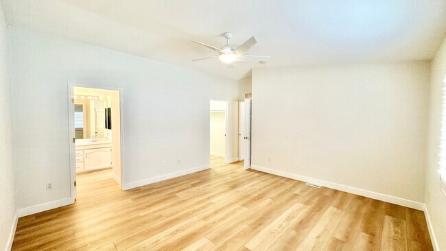 Building Photo - Light, Bright, and Freshly Updated Home in the Gated & Desirable Champagne Village 55+ Community!