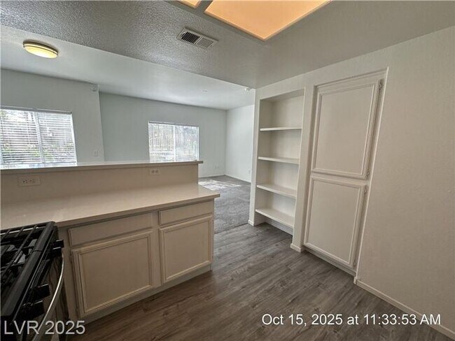 Building Photo - SPACIOUS FIRST-FLOOR CONDO LOCATED IN A GA...