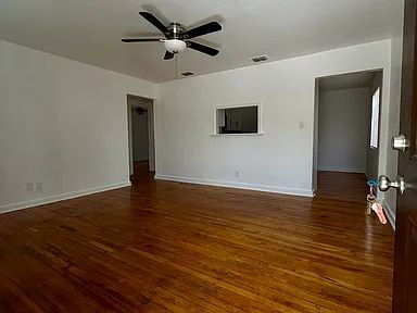 Building Photo - Charming Centrally Located Home | Wood Floors + Fenced Yard