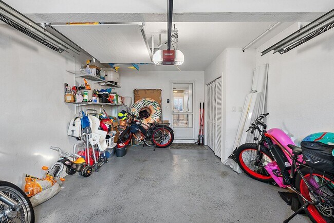 Building Photo - Two Bedroom/Two and a half bath gated townhome.